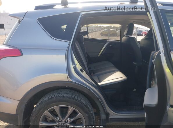 JTMDJREV3HD140944 2017 TOYOTA RAV4 HYBRID Silver VIN sticker view