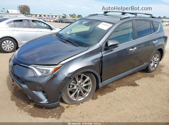 JTMDJREV3HD142953 2017 TOYOTA RAV4 HYBRID Gray Vista tres cuartos delantera izquierda