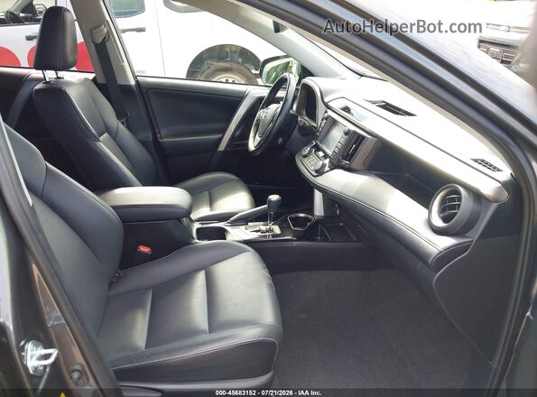 JTMDJREV3HD142953 2017 TOYOTA RAV4 HYBRID Gray Vista interior delantera