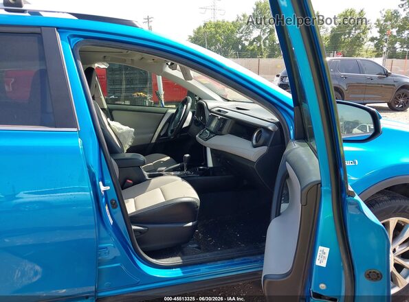 JTMDJREV4GD037028 2016 TOYOTA RAV4 HYBRID Blue წინა სალონის ხედი