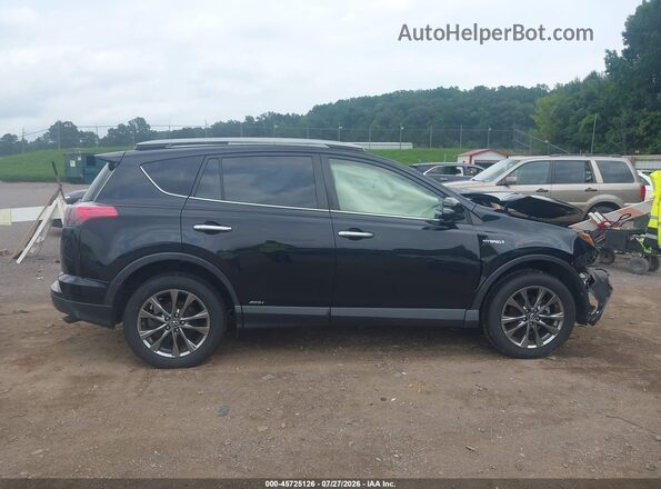 JTMDJREV5JD226164 2018 TOYOTA RAV4 HYBRID Gray Rear interior view