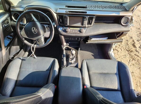 JTMDJREV6GD038844 2016 TOYOTA RAV4 White Dashboard view