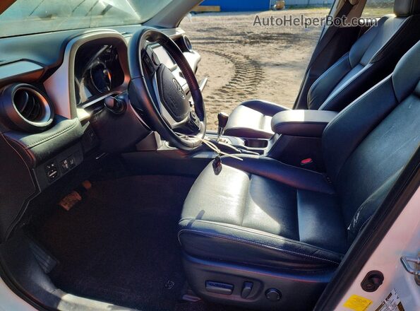 JTMDJREV6GD038844 2016 TOYOTA RAV4 White Front interior view
