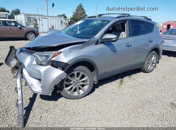 JTMDJREV6JD208174 2018 TOYOTA RAV4 HYBRID Silver Vista tres cuartos delantera izquierda