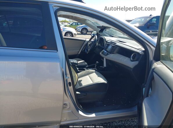 JTMDJREV6JD208174 2018 TOYOTA RAV4 HYBRID Silver Vista interior delantera