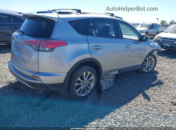 JTMDJREV6JD208174 2018 TOYOTA RAV4 HYBRID Silver Trasero derecho