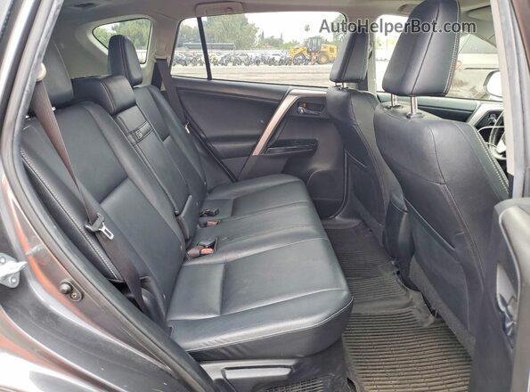JTMDJREV7GD055023 2016 TOYOTA RAV4 Gray Widok wnętrza z tyłu