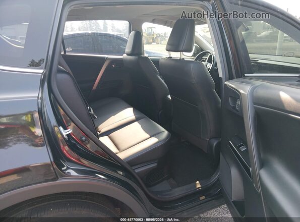 JTMDJREV7JD235660 2018 TOYOTA RAV4 HYBRID Black 