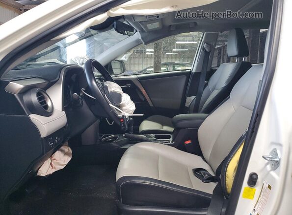 JTMDJREV8GD048663 2016 TOYOTA RAV4 White Вид салону спереду