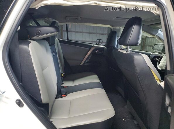 JTMDJREV8GD048663 2016 TOYOTA RAV4 White Вид задньої частини салону
