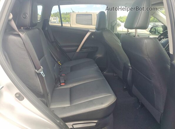 JTMDJREV8GD051501 2016 TOYOTA RAV4 Silver უკანა სალონის ხედი