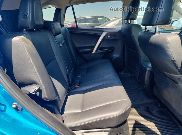 JTMDJREV8JD195119 2018 TOYOTA RAV4 Blue Вид задніх сидінь