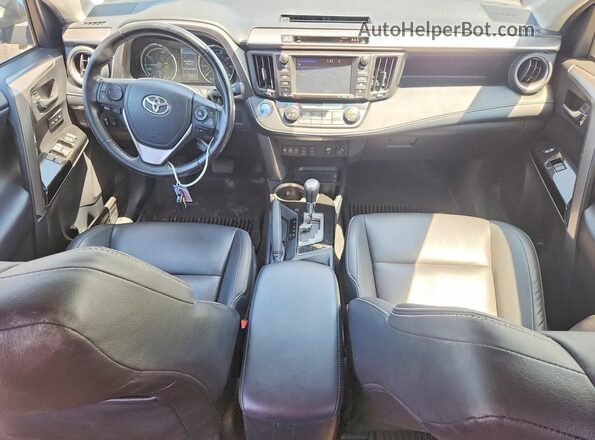 JTMDJREV8JD195119 2018 TOYOTA RAV4 Blue Вид панелі приладів
