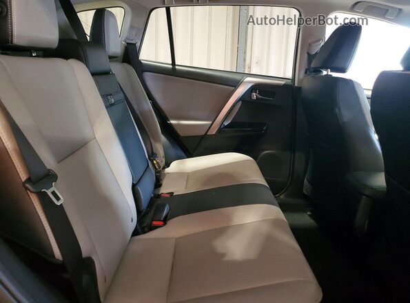 JTMDJREV9HD144769 2017 TOYOTA RAV4 Gray Rear interior view