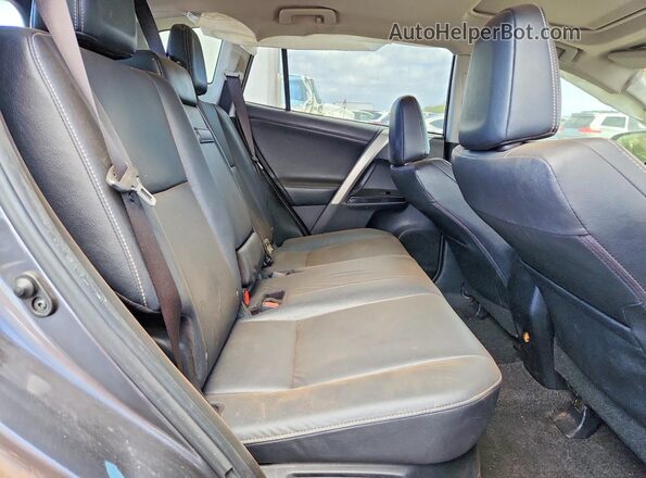 JTMDJREVXHD147907 2017 TOYOTA RAV4 Угольный Вид задней части салона