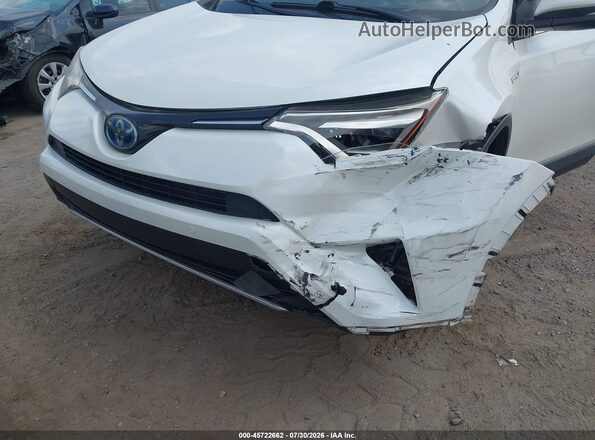 JTMDJREVXJD249262 2018 TOYOTA RAV4 HYBRID White 