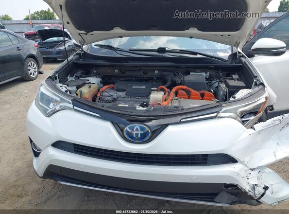 JTMDJREVXJD249262 2018 TOYOTA RAV4 HYBRID White Հետևի տեսք