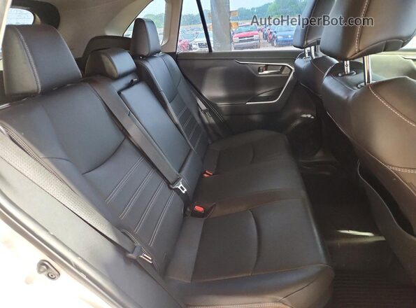 JTMDWRFV2LJ047097 2020 TOYOTA RAV4 White Rear interior view