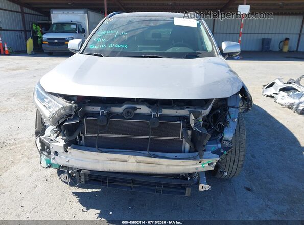JTMDWRFV6LD544605 2020 TOYOTA RAV4 HYBRID Silver Rear interior view