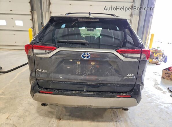 JTME6RFV0NJ020598 2022 TOYOTA RAV4 Gray Vista trasera