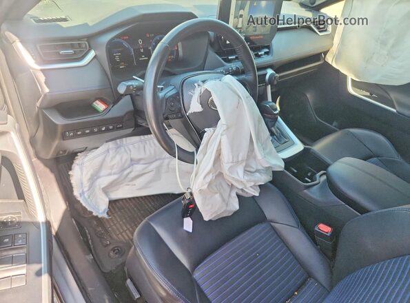 JTME6RFV8RD567199 2024 TOYOTA RAV4 Silver Առջևի վահանակի տեսք