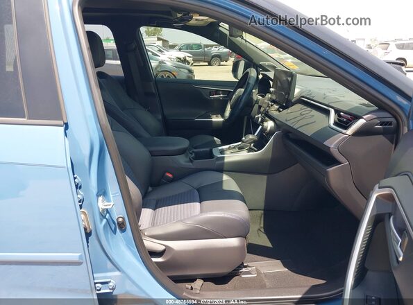 JTME6RFV8SD570268 2025 TOYOTA RAV4 HYBRID Blue Widok wnętrza z przodu