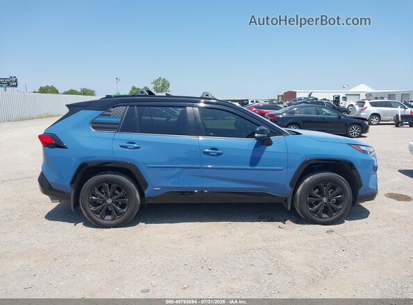 JTME6RFV8SD570268 2025 TOYOTA RAV4 HYBRID Blue Widok wnętrza z tyłu
