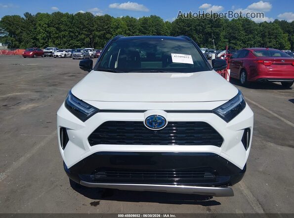 JTME6RFVXRD559332 2024 TOYOTA RAV4 HYBRID White Vista interior trasera