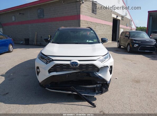 JTMEWRFV7KJ016382 2019 TOYOTA RAV4 HYBRID White ხელსაწყოთა პანელის ხედი