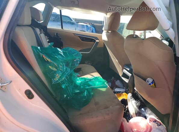 JTMH1RFV0KJ002853 2019 TOYOTA RAV4 White Rear seats view