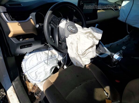 JTMH1RFV0KJ002853 2019 TOYOTA RAV4 White Dashboard view
