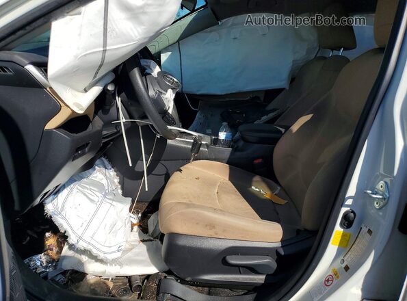 JTMH1RFV0KJ002853 2019 TOYOTA RAV4 White Front interior view