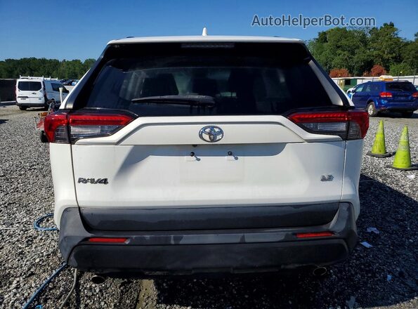 JTMH1RFV0KJ002853 2019 TOYOTA RAV4 White Rear view
