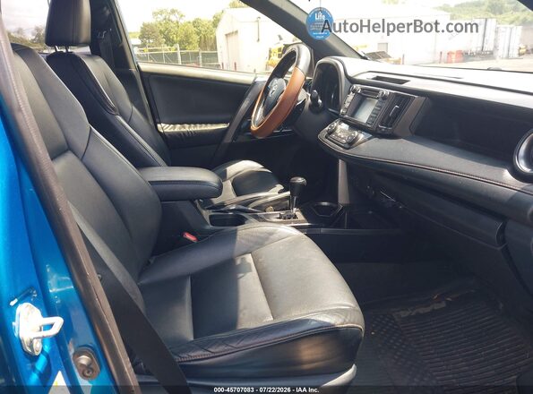 JTMJFREV0GD183561 2016 TOYOTA RAV4 Blue Front interior view