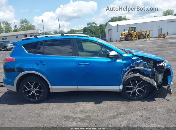 JTMJFREV0GD183561 2016 TOYOTA RAV4 Blue Rear interior view