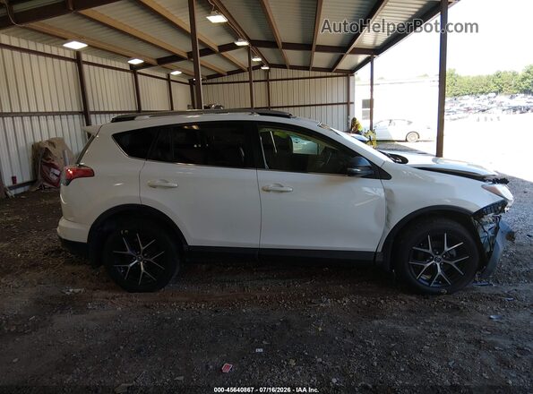 JTMJFREV4HJ700220 2017 TOYOTA RAV4 White Widok wnętrza z tyłu