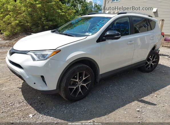 JTMJFREV6JJ187719 2018 TOYOTA RAV4 White Vista tres cuartos delantera izquierda