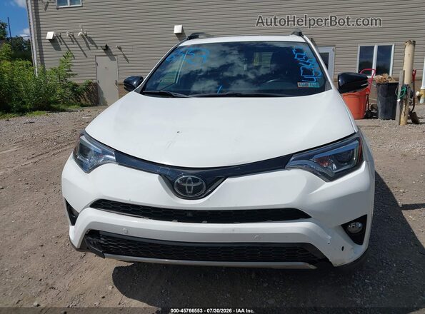 JTMJFREV6JJ187719 2018 TOYOTA RAV4 White Vista interior trasera