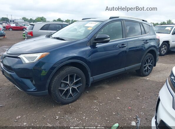 JTMJFREV7HJ708571 2017 TOYOTA RAV4 Dark Blue Vista tres cuartos delantera izquierda