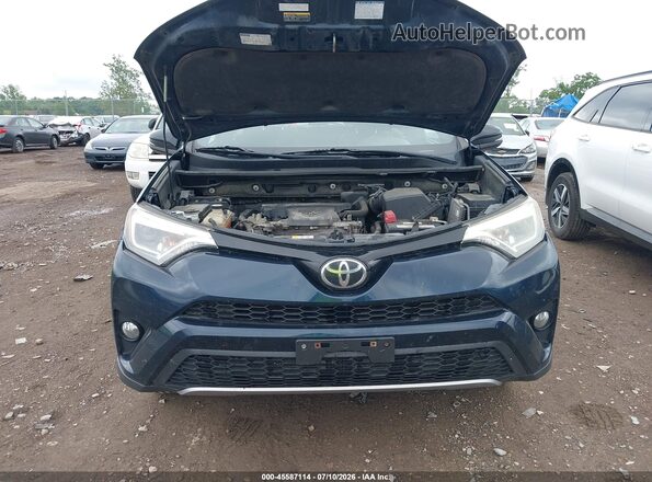 JTMJFREV7HJ708571 2017 TOYOTA RAV4 Dark Blue Vista trasera