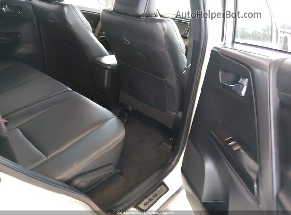 JTMJFREV9HJ162436 2017 TOYOTA RAV4 White Vista de la etiqueta del VIN