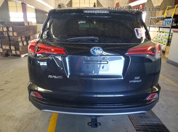 JTMJJREV0JD155118 2018 TOYOTA RAV4 Black Vista trasera
