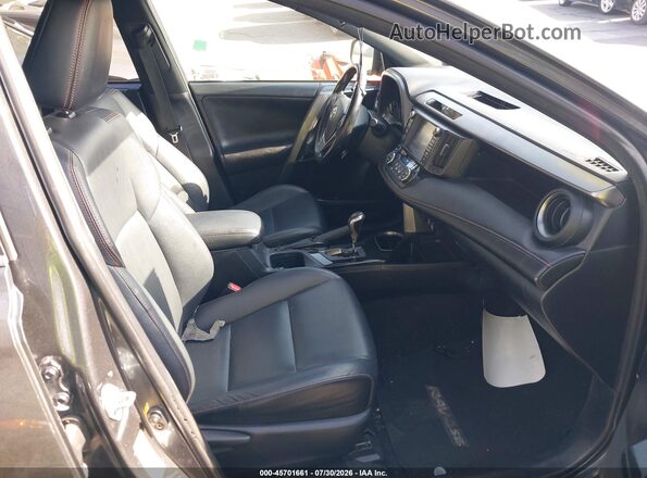 JTMJJREV3JD173774 2018 TOYOTA RAV4 HYBRID Gray წინა სალონის ხედი