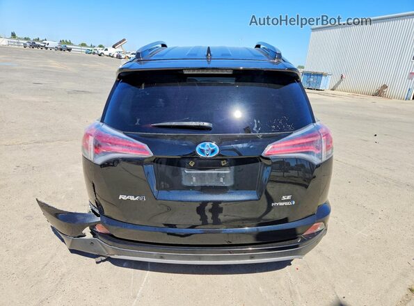JTMJJREV4HD077016 2017 TOYOTA RAV4 Black Вид ззаду