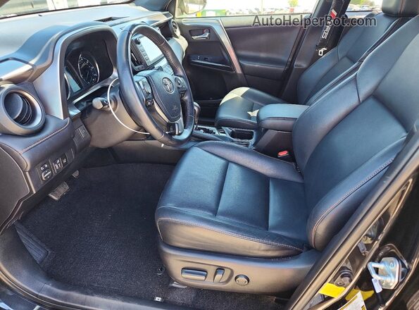 JTMJJREV4HD077016 2017 TOYOTA RAV4 Black Вид салону спереду