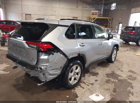 JTMLWRFV1KD030946 2019 TOYOTA RAV4 HYBRID Серебряный Задняя правая четверть