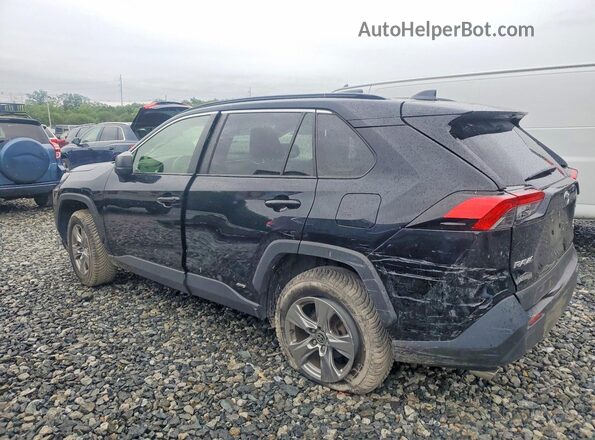 JTMLWRFV8PD173433 2023 TOYOTA RAV4 Black Trasero izquierdo
