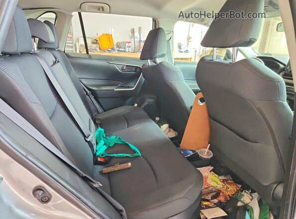 JTMMWRFV4KD010758 2019 TOYOTA RAV4 Silver Vista interior trasera