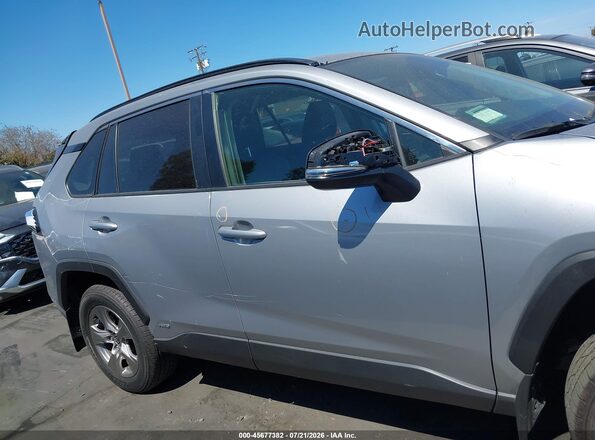 JTMMWRFV9RD221805 2024 TOYOTA RAV4 HYBRID Silver Սալոնի հետևի տեսք