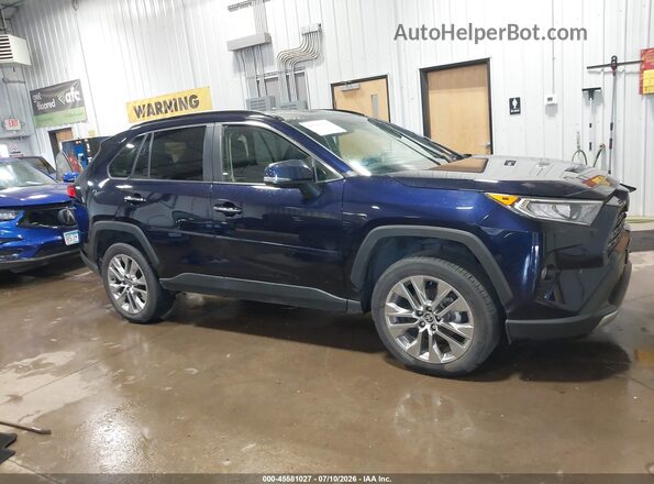 JTMN1RFV3MD073307 2021 TOYOTA RAV4 Dark Blue Rear interior view